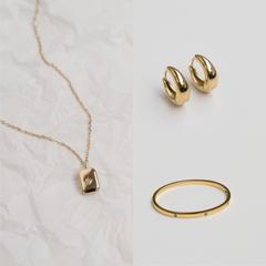 The Essentials Set in Gold - gold hoop earrings, gold pendant necklace and gold bangle bracelet jewellery set - La Musa Jewellery