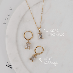The Kiara Set in White.- gold and cubic zirconia pendant necklace and huggie earrings jewellery set - La Musa Jewellery