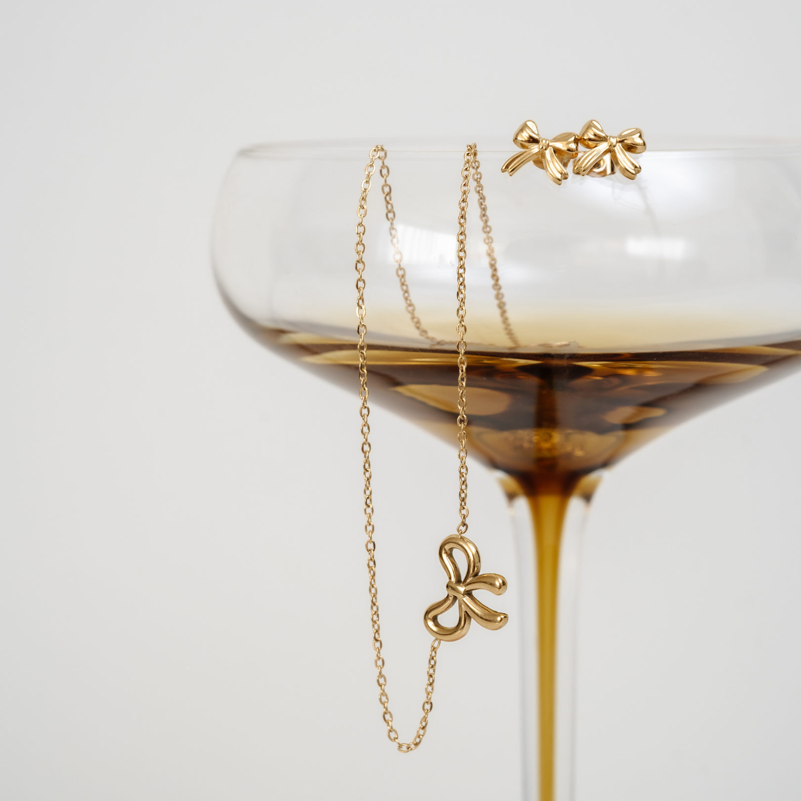 Baby Bow Studs - Gold - La Musa Jewellery